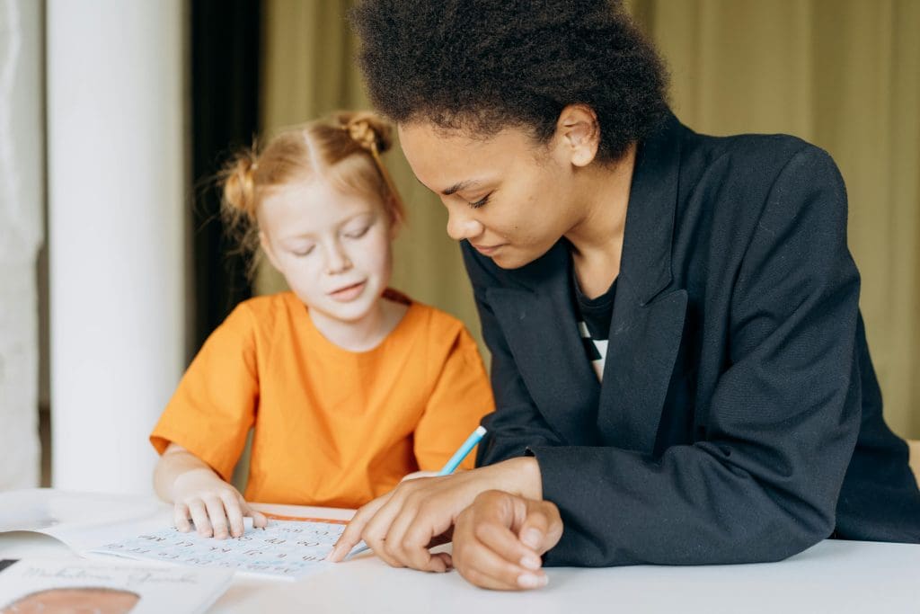 This is a photo of a student being tutored in reading in Nashville.